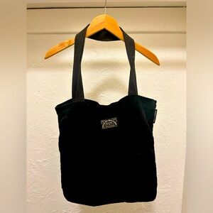 Deus Ex Machina black corduroy shoulder tote bag. Canvas straps. Zip pocket.